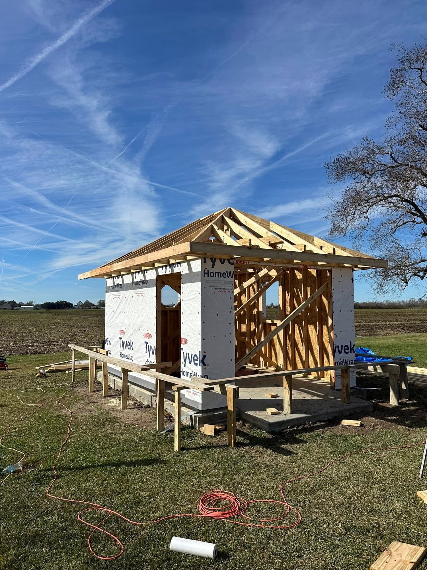 Pool house framing on new concrete pad — Lafourche Parish